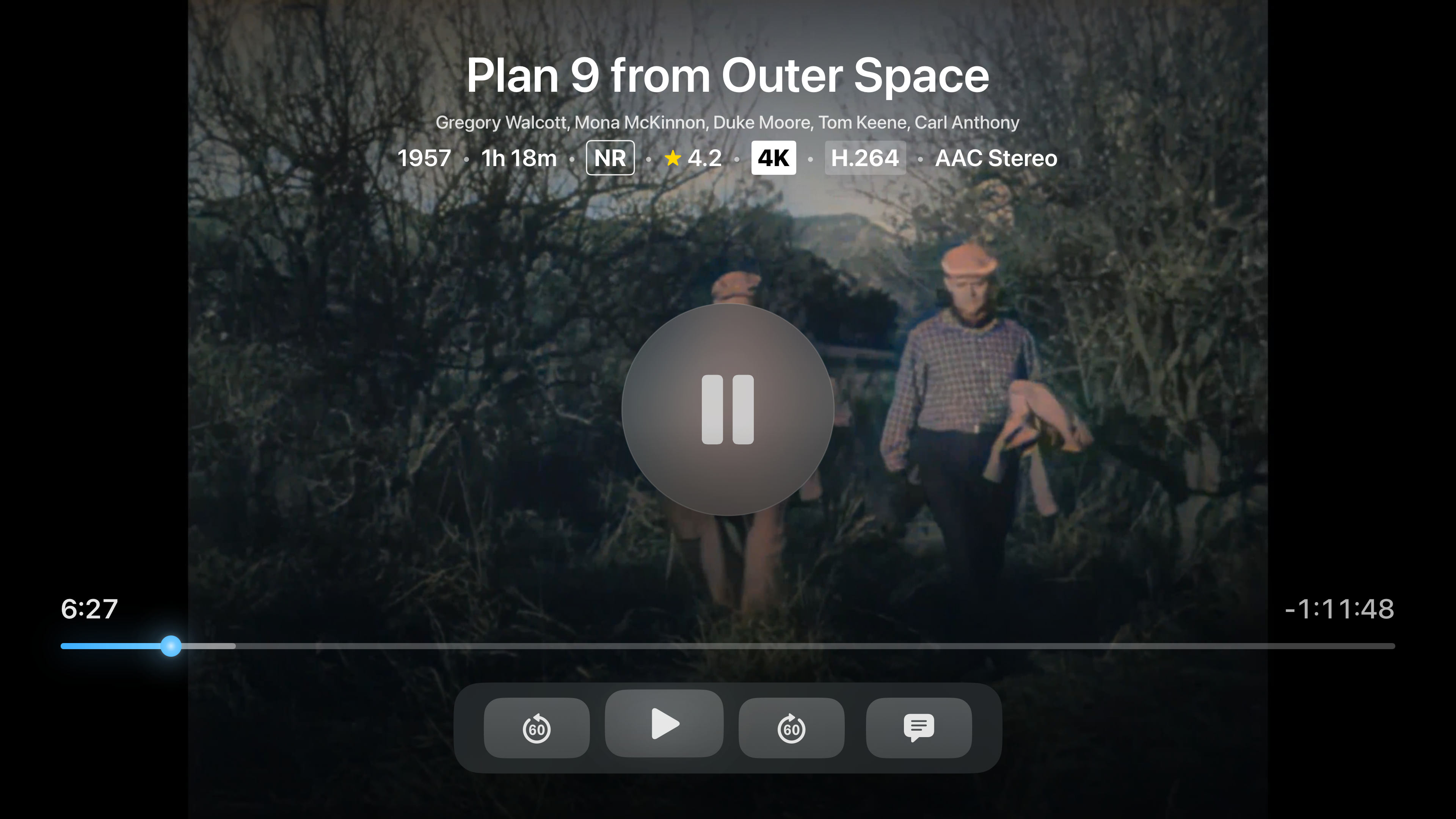 Trovu video player on Apple TV showing playback controls, media info, and progress bar
